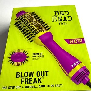 NWT. In box never opened hair dryer brush. Lime and purple.